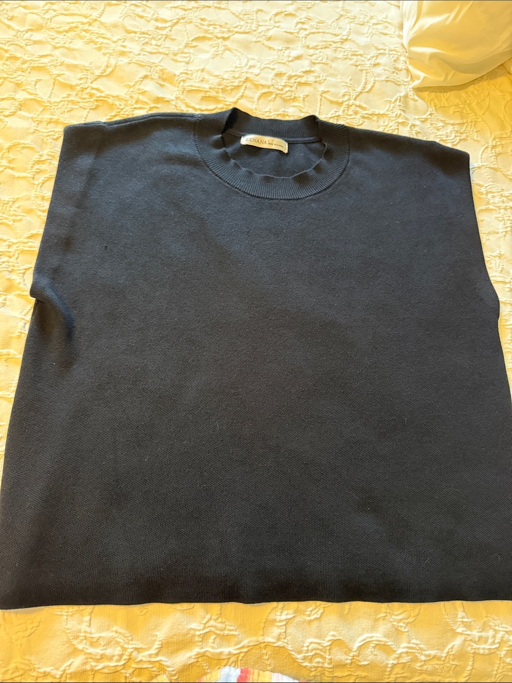 Minimalist Black Sleeveless Knit Top